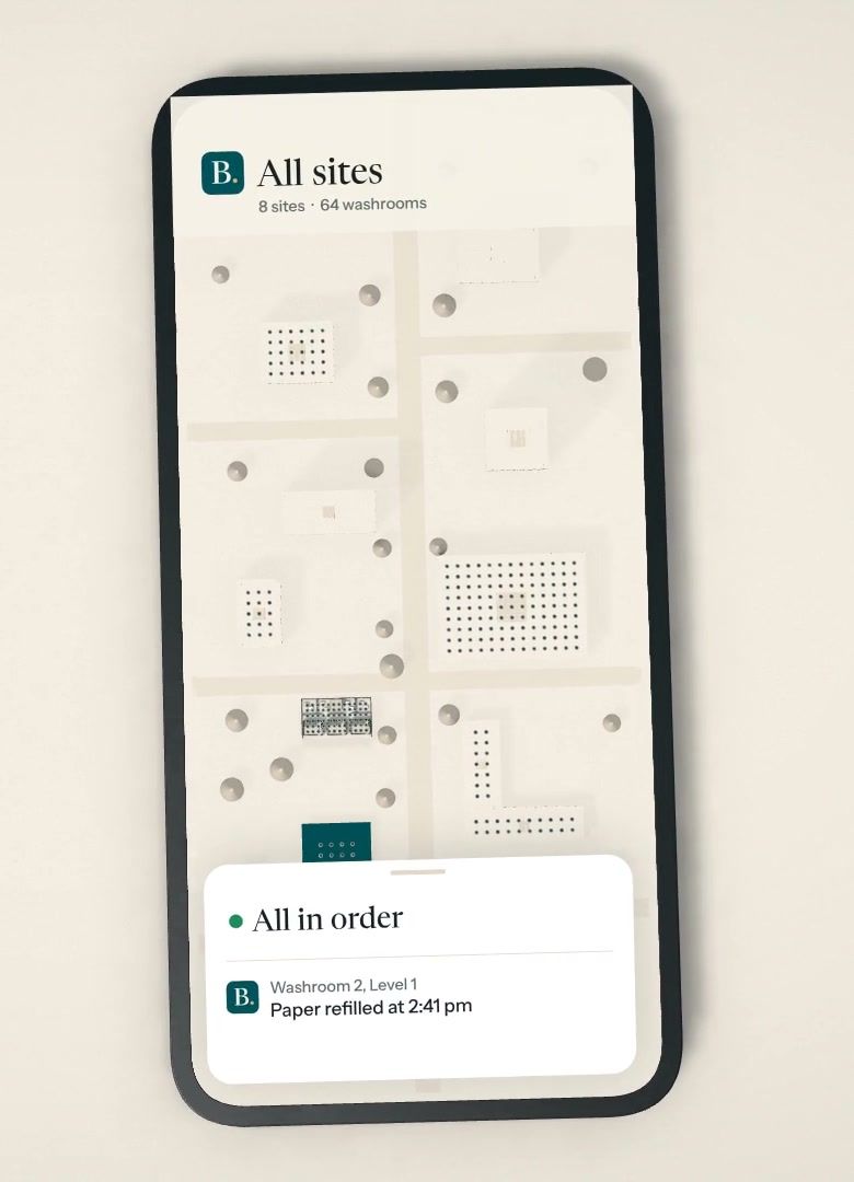 A phone with the Brimsight app: every site on a map and a note that all is in order.